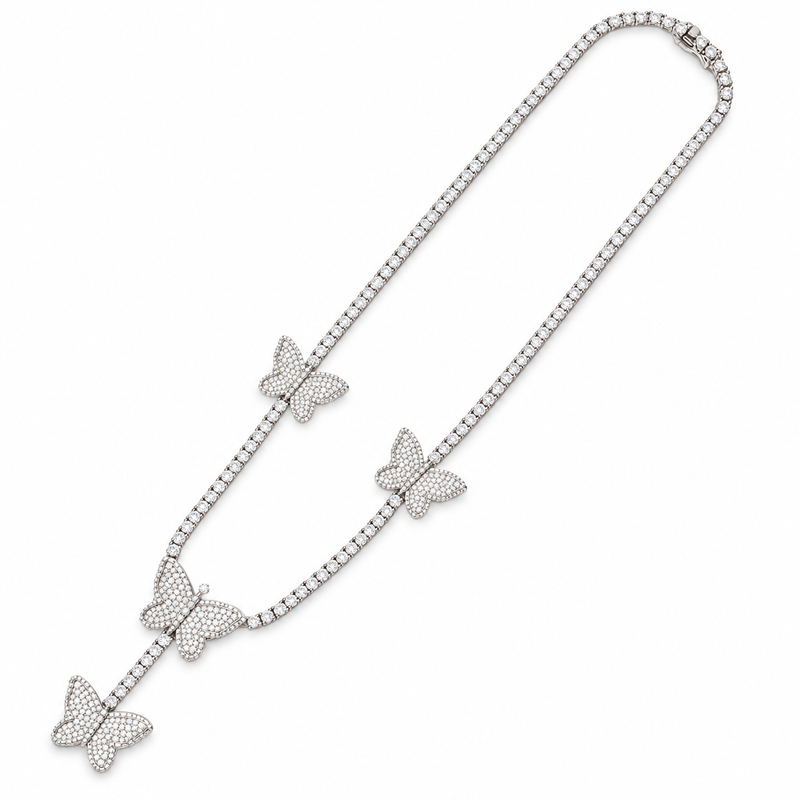 White-metal butterfly tennis necklace on a white background