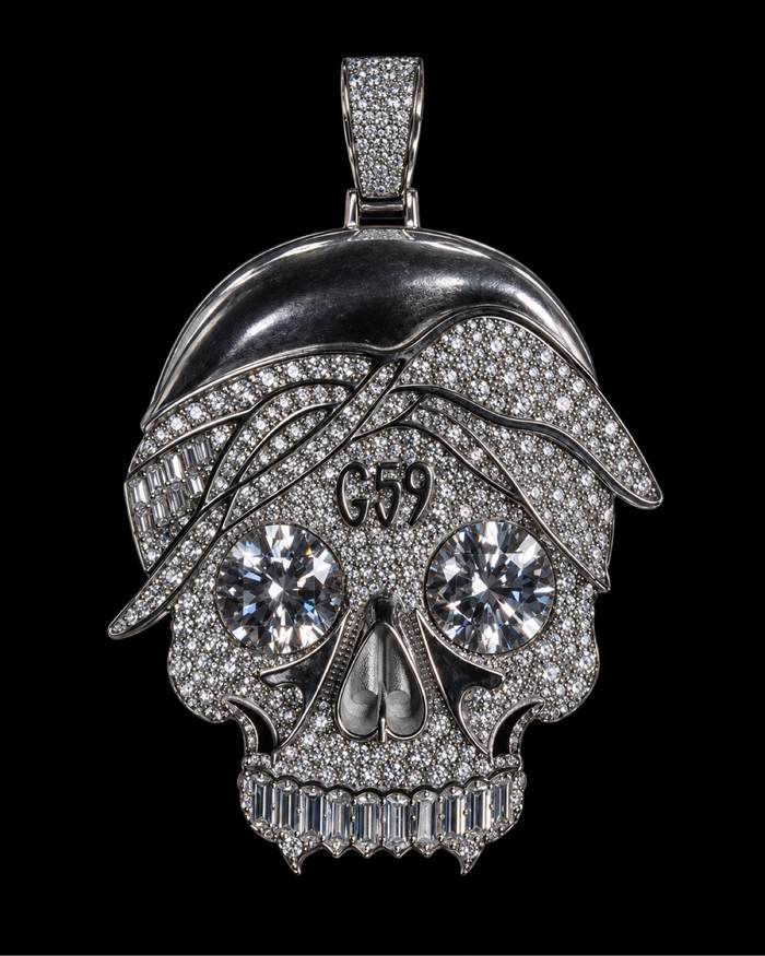 G59 custom skull pendant fully iced with diamonds by Mars Jewelers