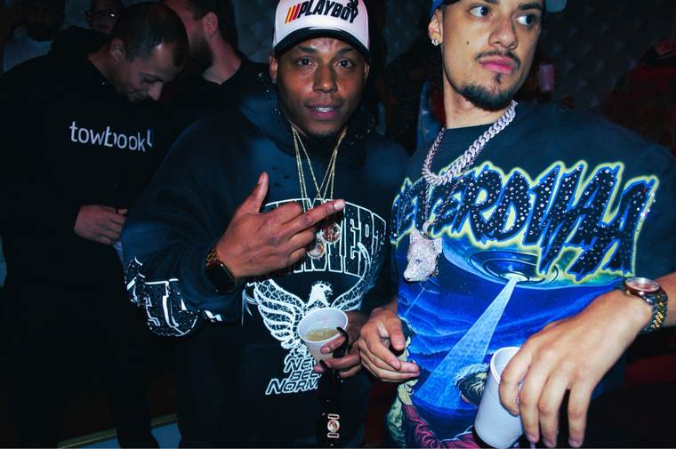 Mars with a client, both wearing custom Mars Jewelers pieces