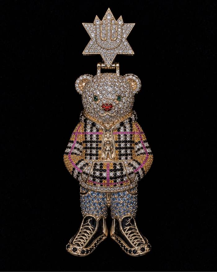 Custom iced teddy bear pendant in gold with multi-color stones by Mars Jewelers