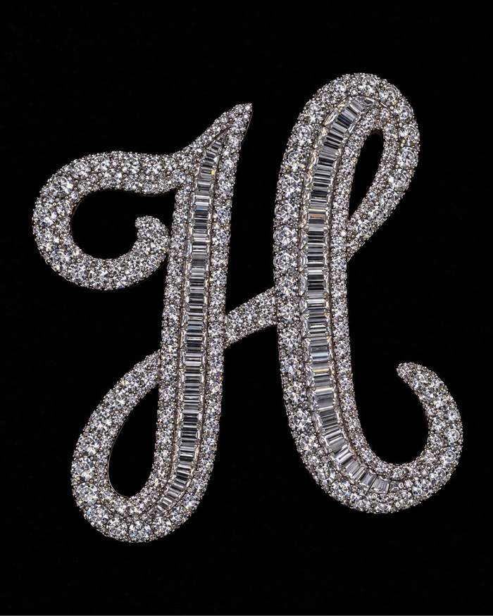 H custom initial pendant with baguette and round diamonds by Mars Jewelers